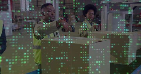 Workers Scanning Boxes in Modern Automated Warehouse
