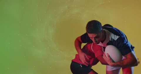 Dynamic Rugby Players Engaging in Action-Packed Tackle with Ball