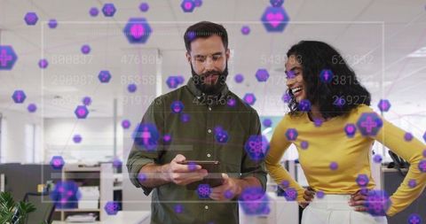 Colleagues collaborating with augmented reality data visualization on mobile in open office