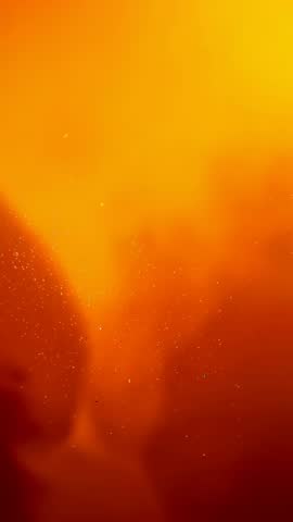 Drifting orange-red haze with glowing flecks vertical ambient background loop