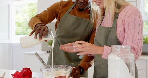 Diverse Couple Enjoying Baking Experience at Home