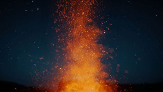 Rising bonfire flames in clear night sky natural ambiance