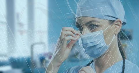 Healthcare professional preparing for surgery with advanced technology