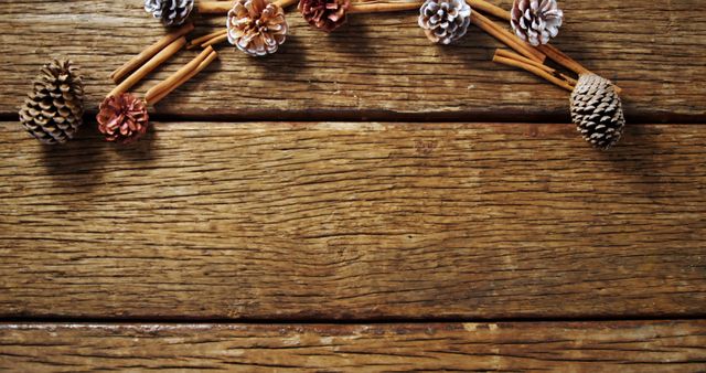 Rustic Wooden Background with Pine Cones and Cinnamon Sticks for Autumn Decor - Download Free Stock Images Pikwizard.com