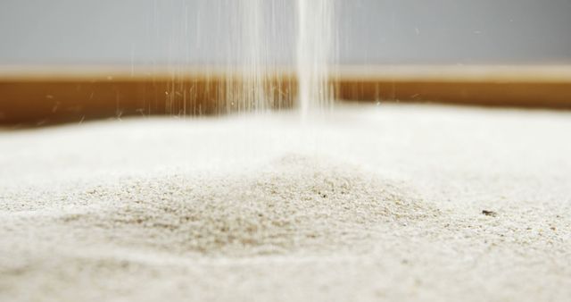 Close-Up of Fine Sand Falling in Pile - Download Free Stock Images Pikwizard.com