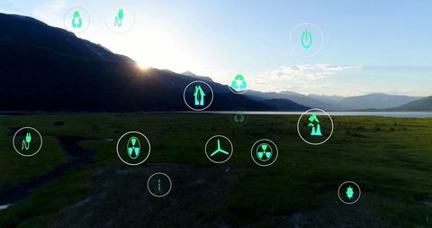 Sustainability Icons over Scenic Sunrise Landscape