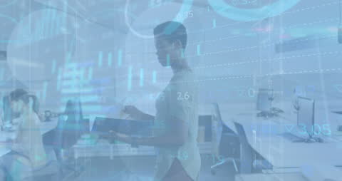 African American Woman Analyzing Financial Data in Modern Office