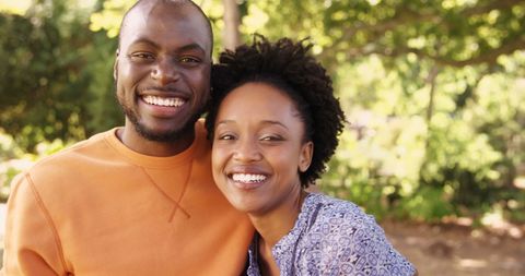 Joyful African American Couple Embracing Outdoors in Sunshine - Download Free Stock Images Pikwizard.com