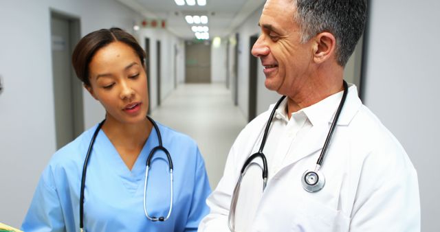 Doctors Discussing Patient Treatment in Healthcare Facility - Download Free Stock Images Pikwizard.com