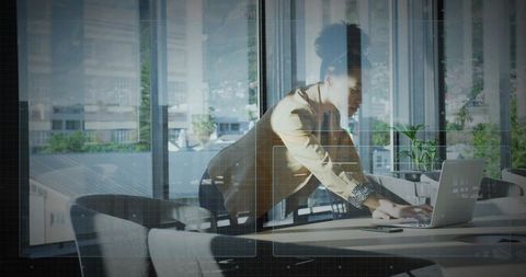 Professional woman engaging with technology in modern office