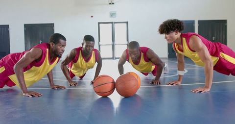 Diverse Basketball Team Engages in Intense Training Session
