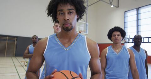Confident Basketball Team Posing Indoor Court - Download Free Stock Images Pikwizard.com