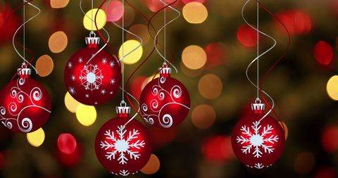 Red Christmas Baubles with Snowflakes and Patterns Against Festive Lights - Download Free Stock Images Pikwizard.com