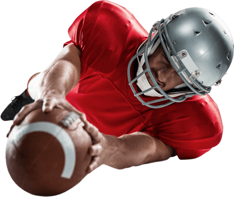 Football player diving to catch ball transparent background