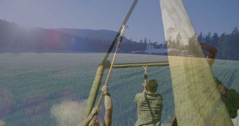 Team vision conquering rope course leaping adventure