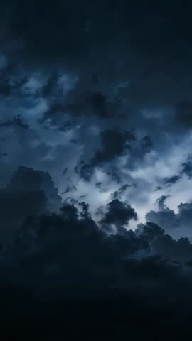 Storm clouds rolling across night sky with lightning flashes cinematic vertical video