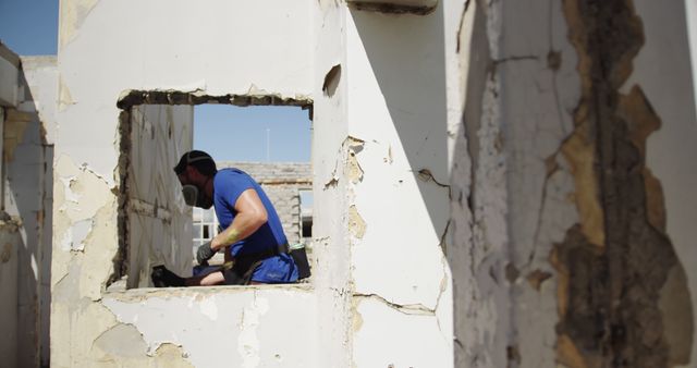 Construction Worker Renovating Old Building - Download Free Stock Images Pikwizard.com