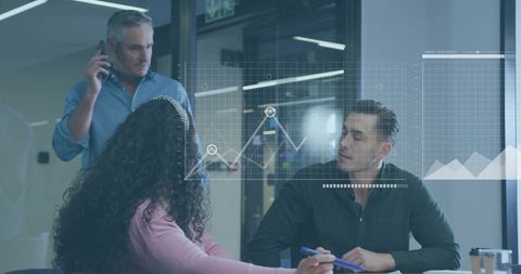 Team Analyzing Data Trends in Modern Office Meeting with Virtual Analytics Overlay