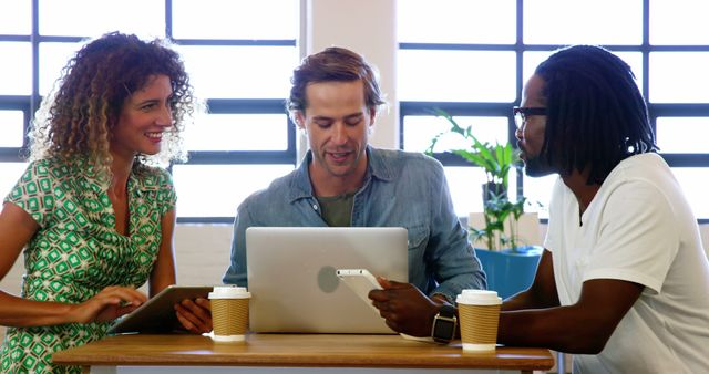 Team Brainstorming Over Coffee in Modern Office - Download Free Stock Images Pikwizard.com