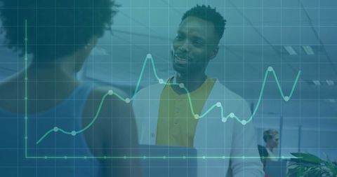 Business Professionals Discussing Analytics in Modern Office