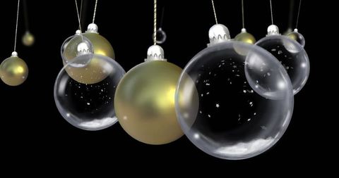 Elegant gold and glass christmas baubles with snow stars