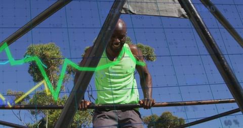 Athlete performing pull-up on outdoor bar wearing neon green tank with data overlay