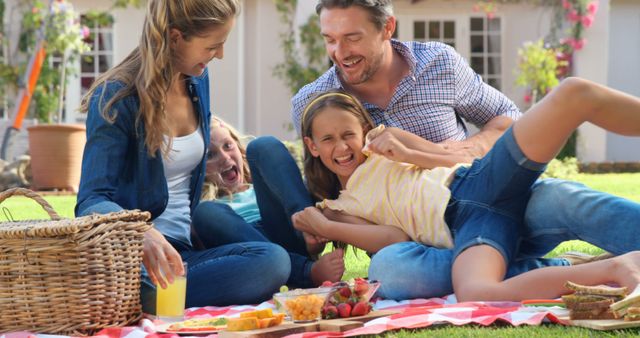 Happy Family Playing Together During Picnic on Sunny Day - Download Free Stock Images Pikwizard.com