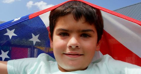 Joyful Child Holding American Flag Outdoors - Download Free Stock Images Pikwizard.com