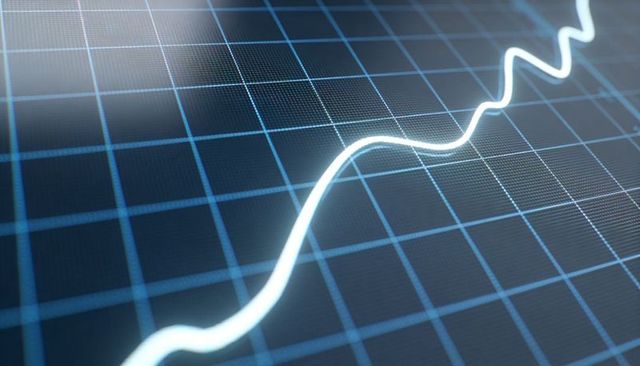 Neon data waveform tracing across blue grid display with glowing line and digital matrix