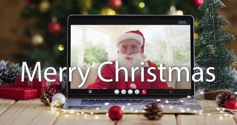 Festive Virtual Greeting with Santa Claus on Laptop - Download Free Stock Images Pikwizard.com