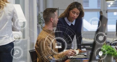 Business Team Collaborating in Modern Office with Digital Technology Concepts