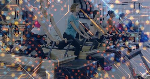 Women practicing pilates reformer with futuristic circuit board overlay for tech-fitness