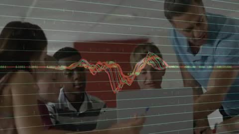 Teacher Engaging Students with Live Data Analysis on Laptop