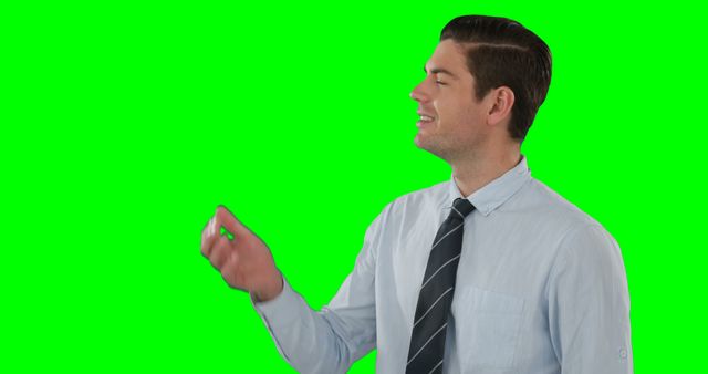 Confident Young Man Gesturing with Hand on Green Screen Background - Download Free Stock Images Pikwizard.com