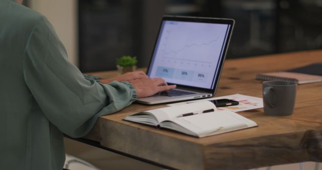 Business Professional Analyzing Data on Laptop in Office - Download Free Stock Images Pikwizard.com