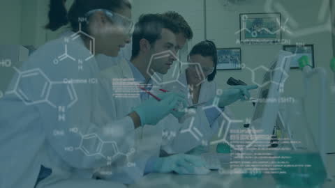 Diverse Scientists Collaborating with Medical Data Animation in Modern Laboratory