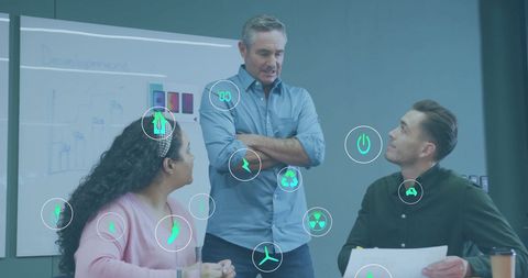 Diverse team discussing eco-friendly ideas with digital overlay