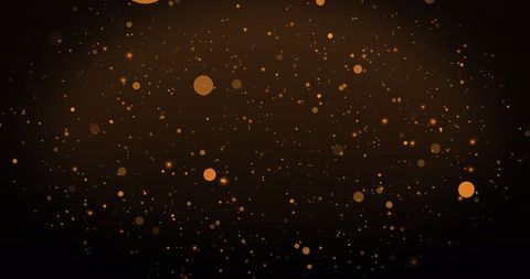 Warm Glowing Orange Particles on Brown Background - Download Free Stock Images Pikwizard.com