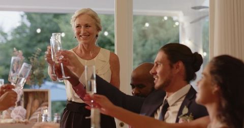 Cheerful Wedding Toast in Celebratory Atmosphere