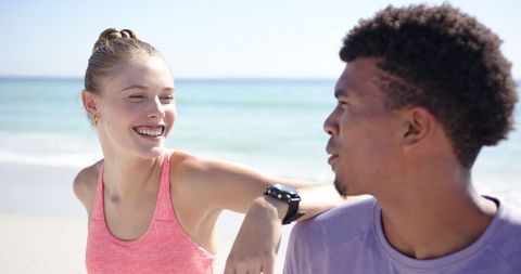Couple Enjoying Beach Day Laughing Together - Download Free Stock Images Pikwizard.com