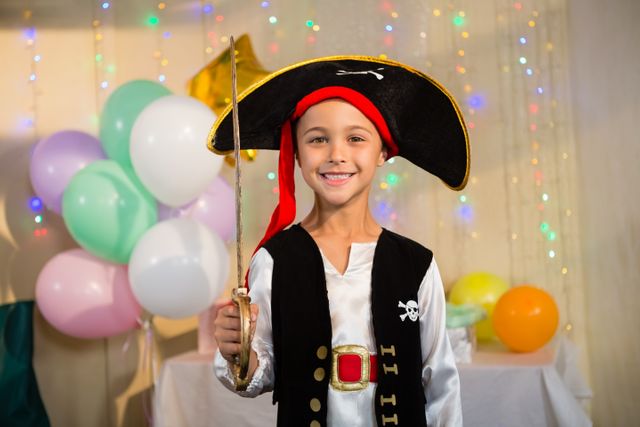 Boy pretending to be as pirate during birthday party at home