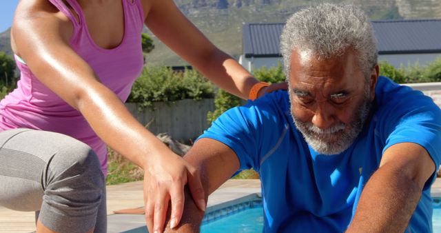 Older Man Exercising with Young Female Trainer by Pool - Download Free Stock Images Pikwizard.com