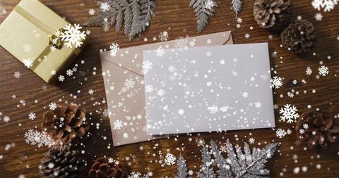 Rustic Holiday Stationery Featuring Blank Envelopes, Gold Gift Box, Pine Cones