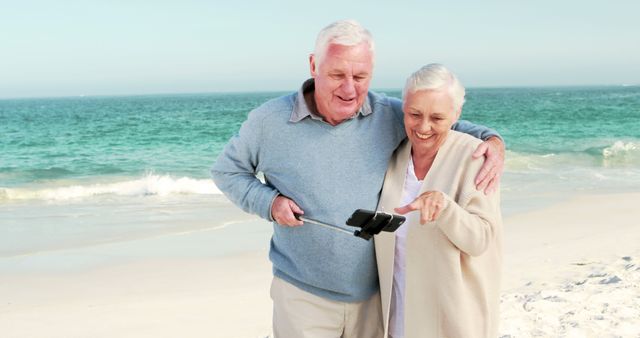 Retired old couple taking selfie on the beach - Download Free Stock Photos Pikwizard.com