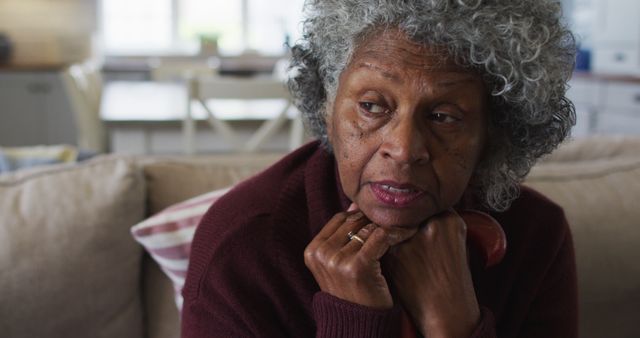 Elderly Woman Reflecting Indoors, Emotional Expression - Download Free Stock Images Pikwizard.com