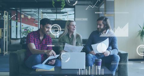 Diverse team discussing analytics strategies in modern office