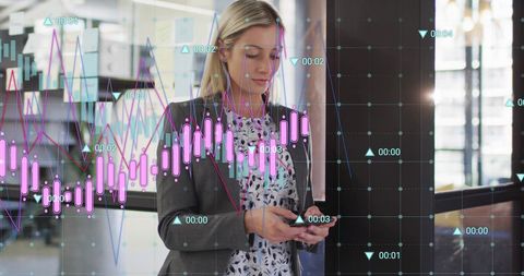 Businesswoman Analyzing Financial Charts via Smartphone in Office