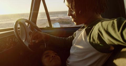 Couple Relaxing Together in Pickup at Sunset Beach - Download Free Stock Images Pikwizard.com