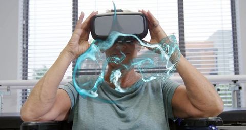 Senior woman in therapy room using virtual reality for cognitive health