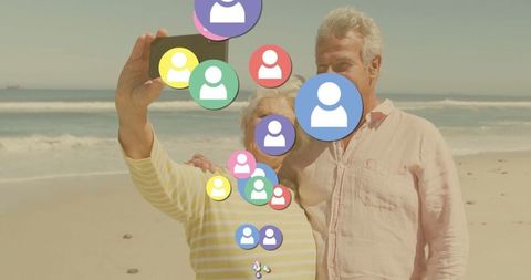 Senior Couple Enjoys Beach Selfie Connecting Through Social Media